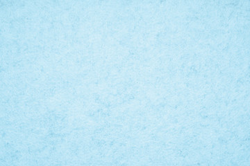 light blue felt background with fiber texture