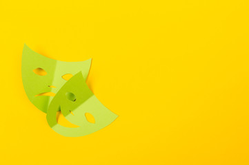 cut out colored paper figures for the holiday Mardi Gras