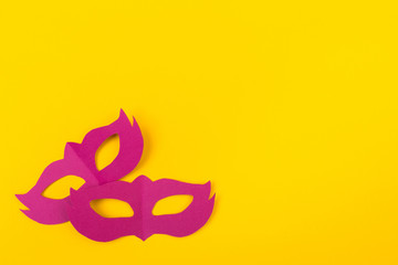 cut out colored paper figures for the holiday Mardi Gras