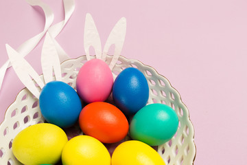 easter eggs on pink background
