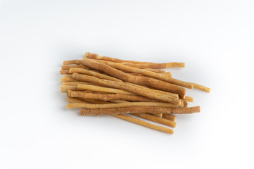 Natural toothbrush Miswak (Kayu Sugi) on white background 