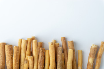 Natural toothbrush Miswak (Kayu Sugi) on white background 