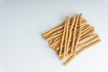 Natural toothbrush Miswak (Kayu Sugi) on white background 