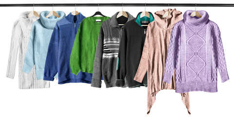 Hanging sweaters isolated