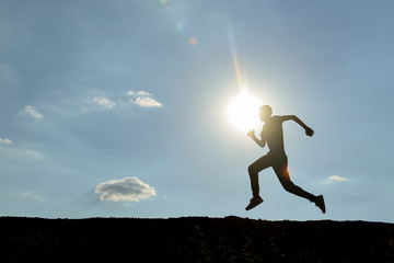 man running in the fresh air in nature