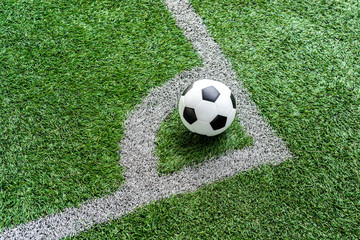 Fototapeta na wymiar Soccer Football on Corner kick line of ball and a soccer field , football field , background texture