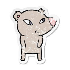 Obraz na płótnie Canvas distressed sticker of a cute cartoon bear