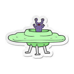 sticker of a cartoon flying saucer