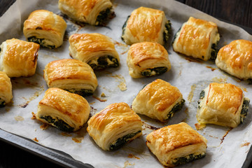 Puff pastry rolls  with spinach and ricotta.
