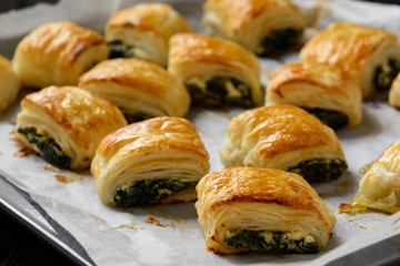 Puff pastry rolls  with spinach and ricotta.