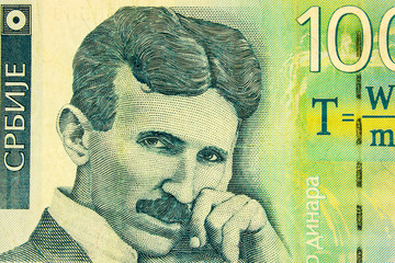 Portrait of scientist and inventor Nikola Tesla on  bank note 100 Serbian dinars.