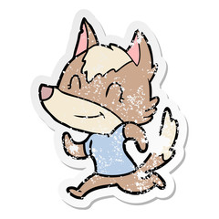 distressed sticker of a friendly cartoon wolf