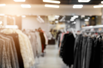 blurred image background with clothing store background