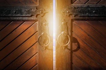 Magic light through open wooden door