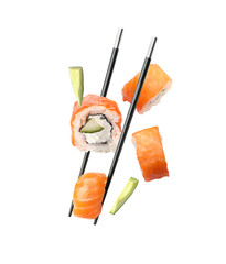 Tasty sushi rolls, chopsticks and avocado on white background