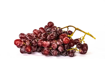 Red grapes on a white background