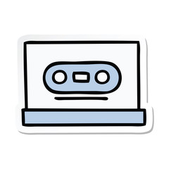 sticker of a cute cartoon retro cassette