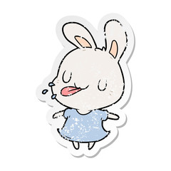 distressed sticker of a cartoon rabbit