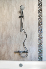 Wall mounted mixer tap