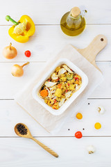 Warm salad with chicken and quinoa in a container