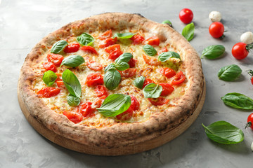 Delicious pizza on grey background