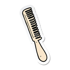 sticker of a cartoon comb