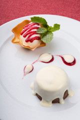 Brownie cake served with decorated ice cream