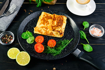 hot pancakes stuffed in a pan for Maslenitsa