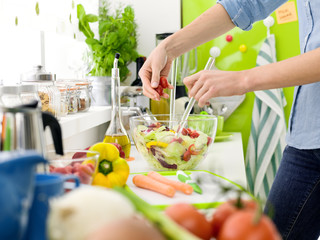 Woman preparing a fresh healthy salad