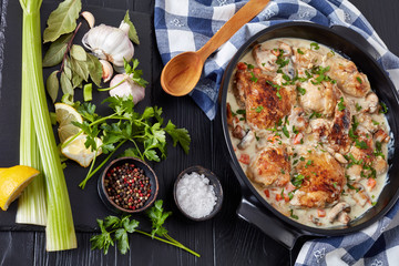 chicken fricassee in a black dutch oven