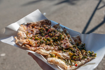 Pita bread with cheese, spinach and chili pepper