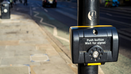 Button to stop the traffic light in Manchester, United Kingdom