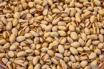 Roasted salted pistachio in shell texture, background - Pistachios Image
