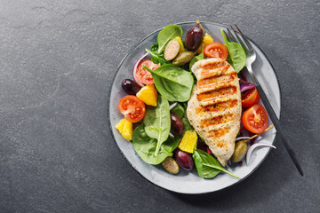 Tasty fresh salad with chicken and vegetables