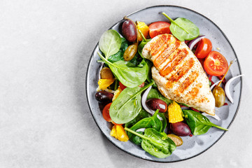Tasty fresh salad with chicken and vegetables