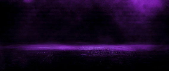 Dark empty room, old brick walls, concrete floor, smoke, pyal, smog. Violet abstract light, night view.