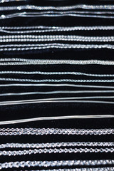 Silver chains on a black background