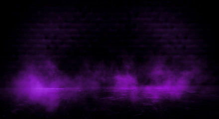 Dark empty room, old brick walls, concrete floor, smoke, pyal, smog. Violet abstract light, night view.