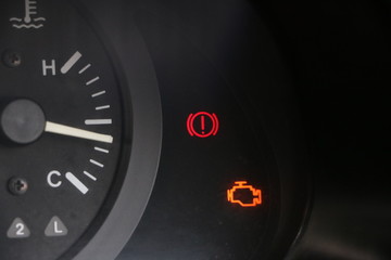Naklejka premium Sing and symbol on car dashboard