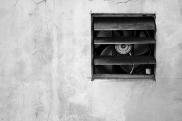 old ventilation system at cement wall