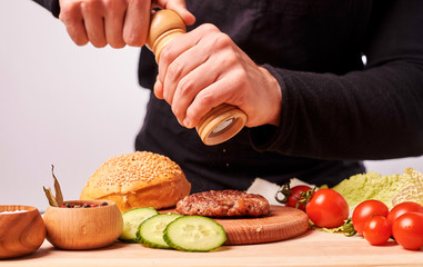 woman cutting vegetables in kitchen