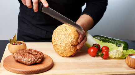 chef is cutting bread with knife