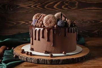 Foto op Plexiglas Sweet chocolate cake on wooden table © Pixel-Shot