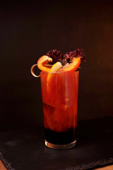 red candle in a glass
