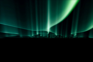 green northern lights against black back ground.