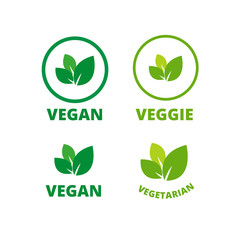 Vegan logo green leaf label template for veggie or vegetarian food package design. Isolated green leaf icon for vegetarian bio nutrition and healthy diet or vegan restaurant menu. Vector set.