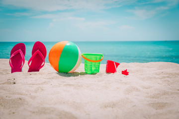 beach toys and flip flops at sea vacation