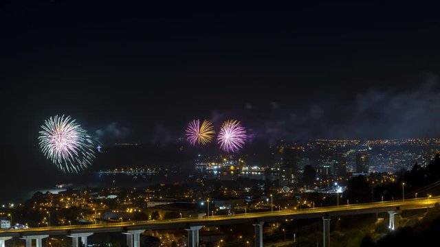 Time lapse - Fireworks at night, over the bay of the city of Puerto Montt, on the occasion of its 166th anniversary