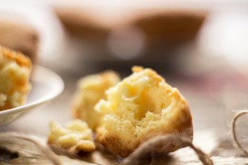 Sweet cupcakes on old wooden background. Macro.