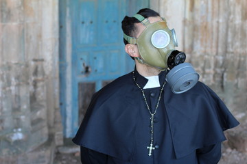 Priest wearing a gas mask